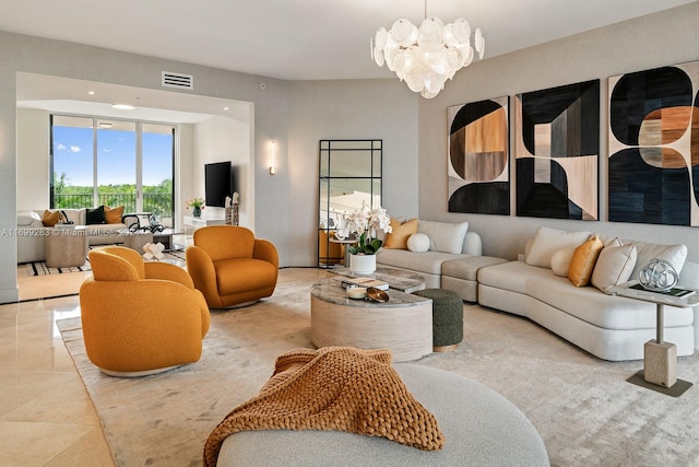 living room featuring an inviting chandelier