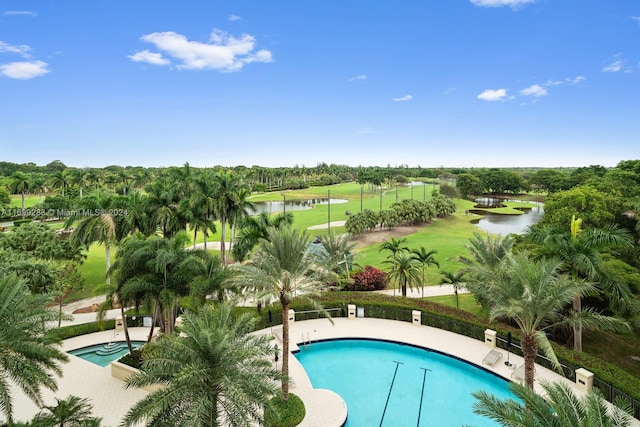 view of pool with a water view