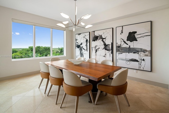 dining space with a notable chandelier