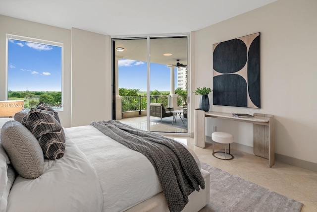 bedroom with light tile patterned flooring and access to exterior