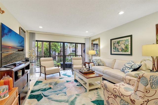 living room with a textured ceiling