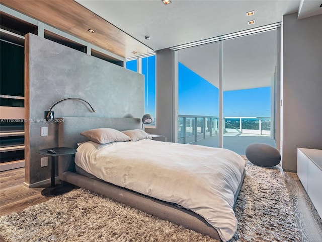 bedroom featuring hardwood / wood-style floors