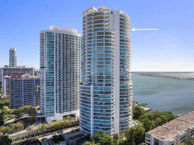 view of property with a water view