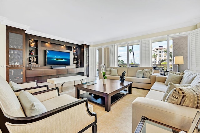 carpeted living room featuring built in features and ornamental molding