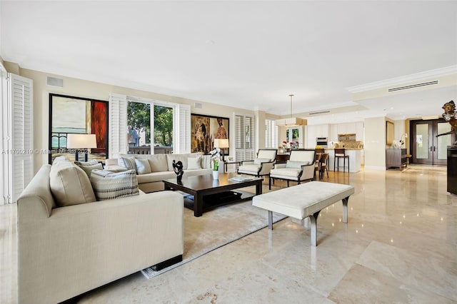 living room featuring ornamental molding