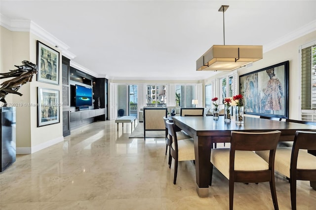 dining area with crown molding