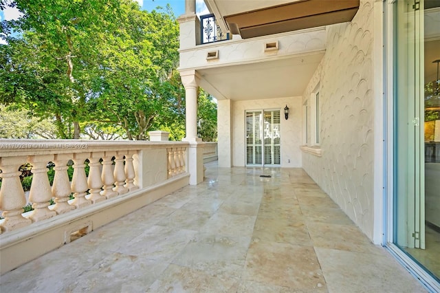 view of patio / terrace with a balcony