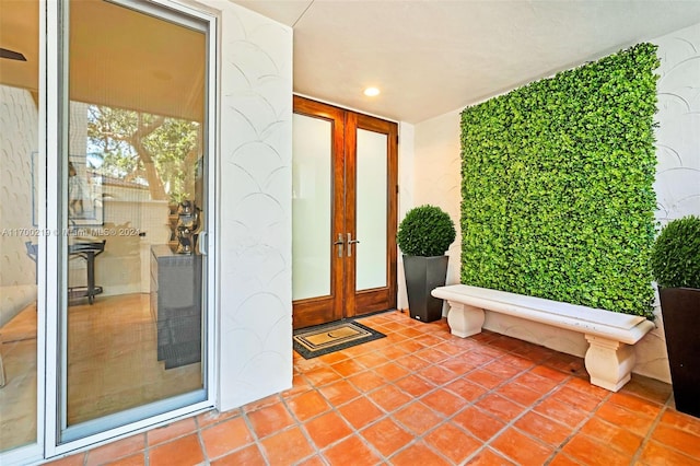 entrance to property featuring french doors