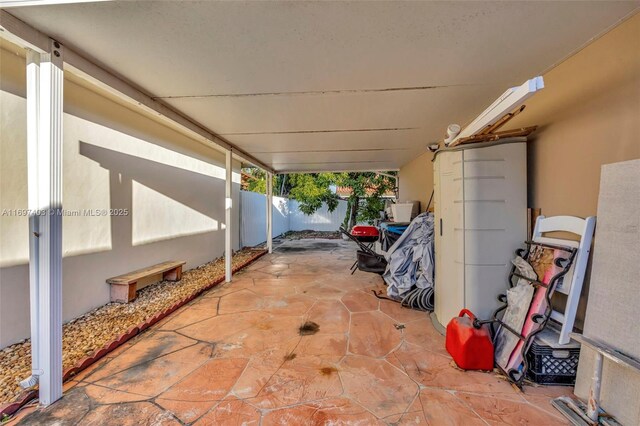 699 NW 134th Pl, Miami, FL 33182 - view of patio / terrace featuring fence