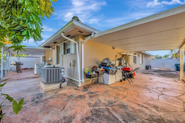 view of patio featuring central air condition unit