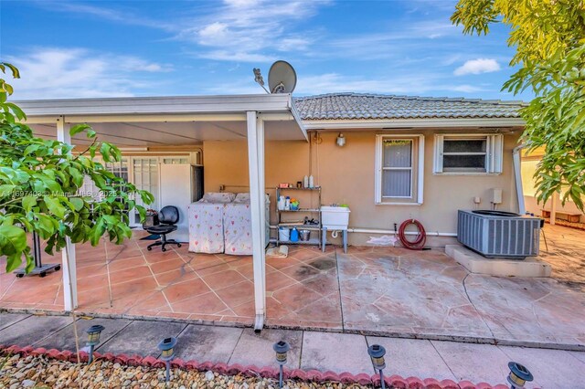 699 NW 134th Pl, Miami, FL 33182 - view of patio with central AC unit
