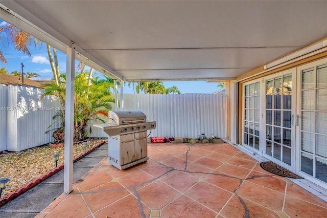 699 NW 134th Pl, Miami, FL 33182 - view of patio / terrace featuring a grill and fence