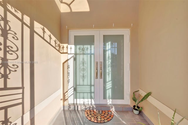 699 NW 134th Pl, Miami, FL 33182 - doorway to property featuring french doors