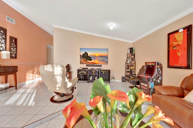 tiled living room with ornamental molding and vaulted ceiling