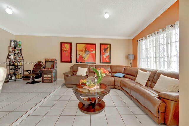 living room featuring lofted ceiling, crown molding, light tile patterned floors, and a textured ceiling