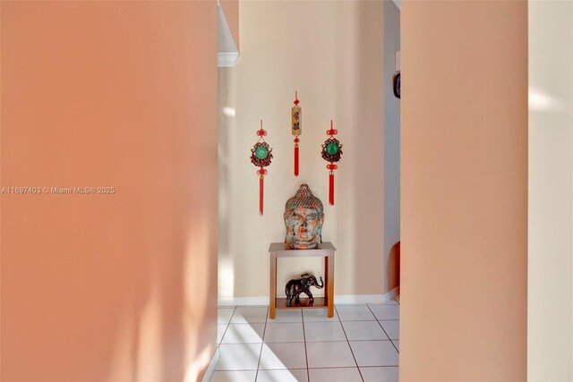 corridor with light tile patterned floors