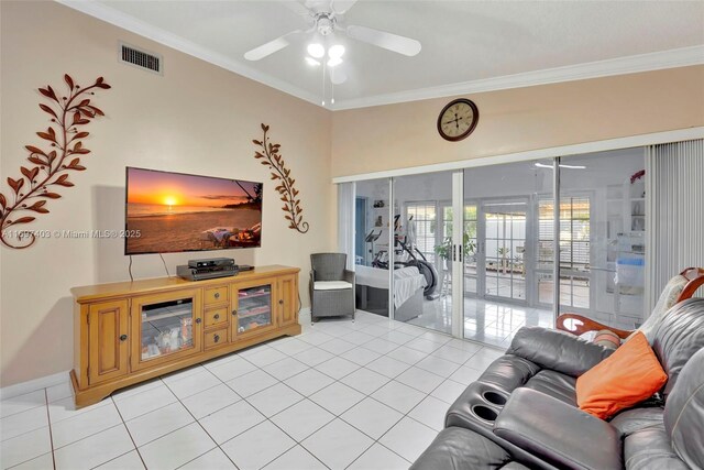 living room with ceiling fan, light tile patterned flooring, crown molding, and french doors