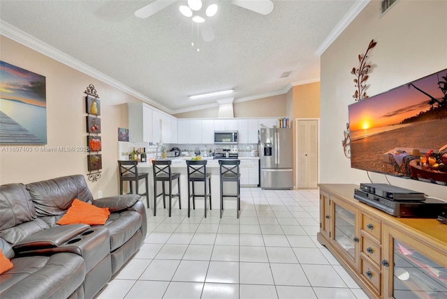 699 NW 134th Pl, Miami, FL 33182 - living room featuring ornamental molding, visible vents, vaulted ceiling, and light tile patterned floors