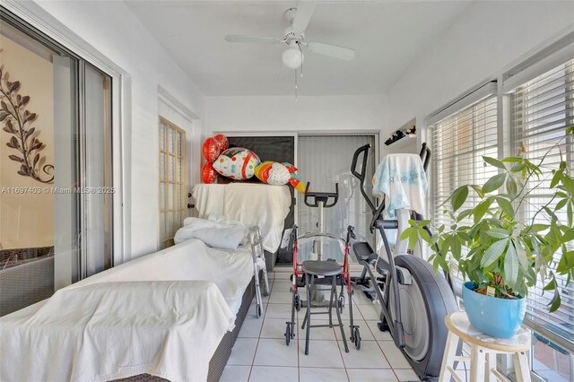 bedroom featuring ceiling fan and light tile patterned floors