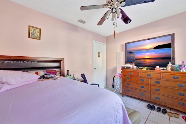 699 NW 134th Pl, Miami, FL 33182 - bedroom with light tile patterned flooring and a ceiling fan