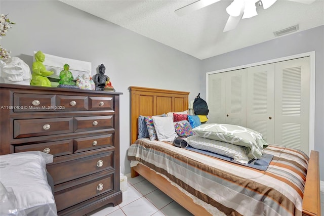699 NW 134th Pl, Miami, FL 33182 - bedroom featuring a closet, light tile patterned floors, and ceiling fan