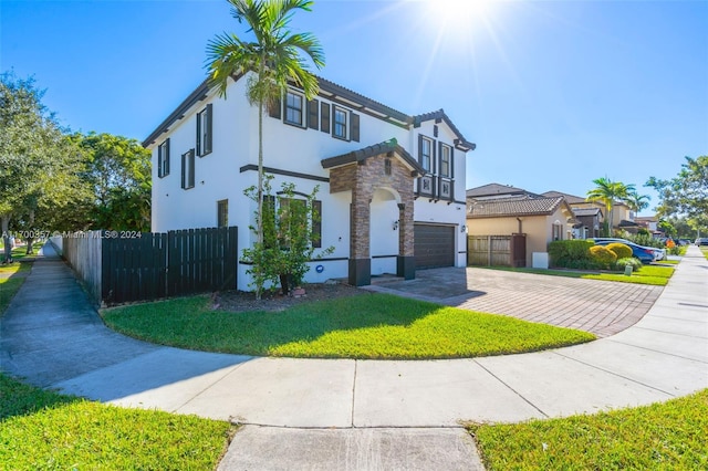 view of front of home with a garage