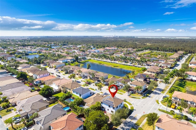 bird's eye view with a water view