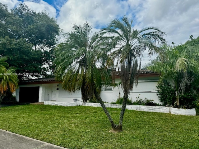 exterior space with a lawn