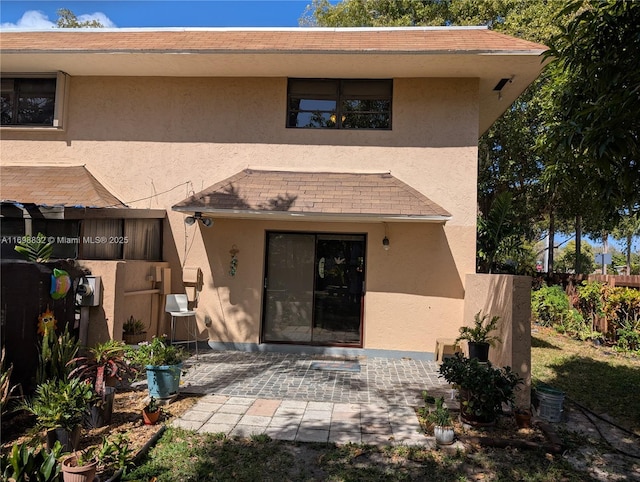 doorway to property featuring a patio