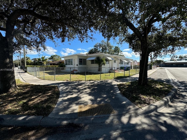 view of front of home with a front lawn