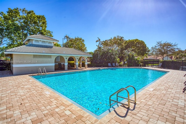 view of pool with a patio area