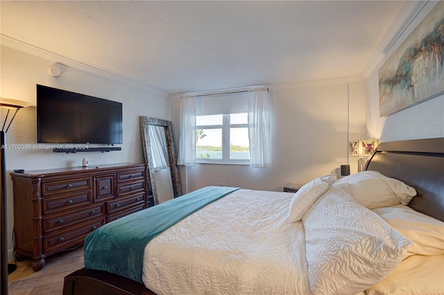 bedroom with crown molding