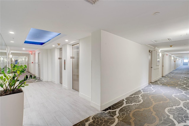 hallway featuring light wood-type flooring