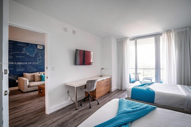 bedroom with wood-type flooring