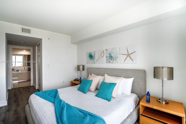 bedroom featuring dark wood-type flooring