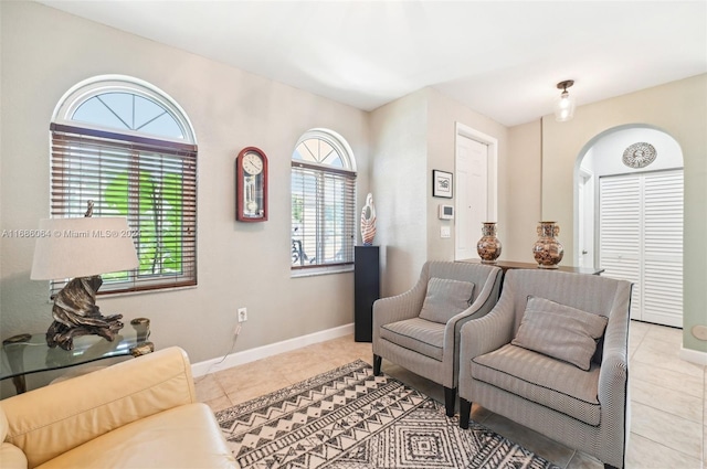 sitting room featuring light tile patterned flooring