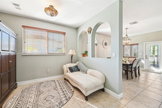 sitting room with light tile patterned flooring