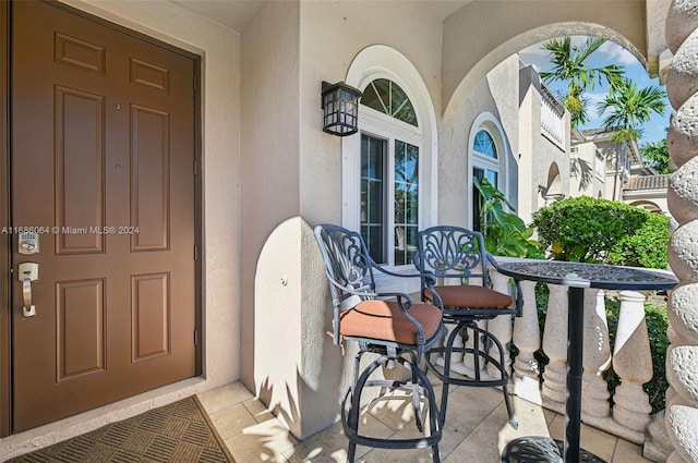 entrance to property with a porch