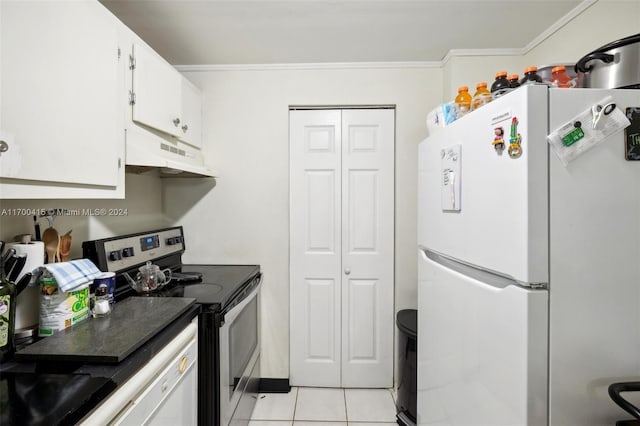 kitchen with white cabinets, light tile patterned floors, white refrigerator, and stainless steel range with electric stovetop