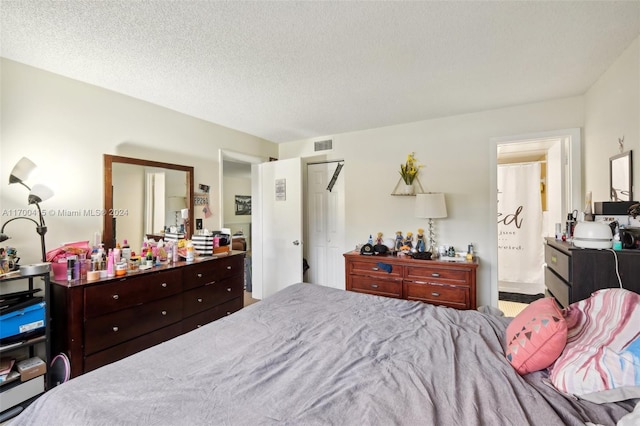 bedroom with a textured ceiling