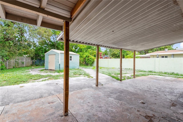 view of patio featuring a shed