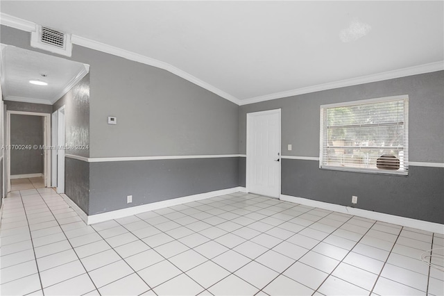 spare room with light tile patterned floors and ornamental molding