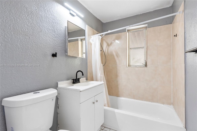 full bathroom featuring vanity, shower / bath combination with curtain, and toilet