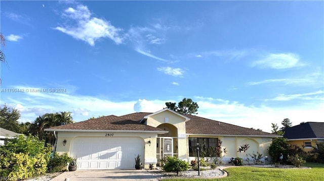 ranch-style house with a front lawn and a garage