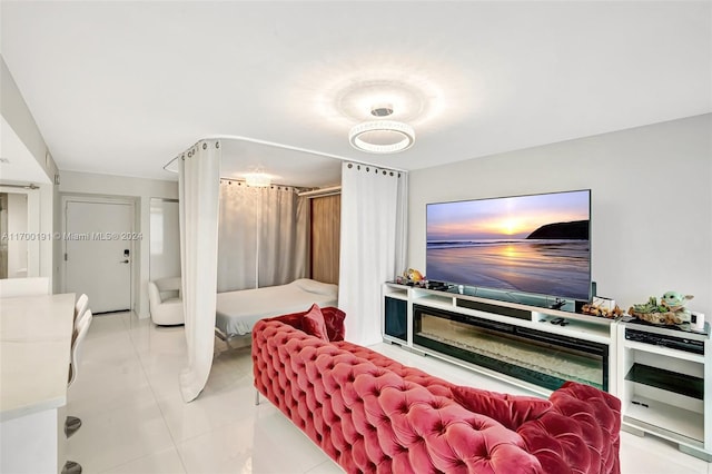 living room with light tile patterned flooring