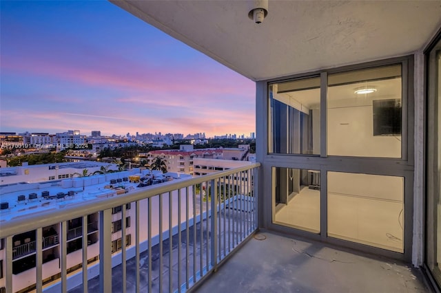 view of balcony at dusk