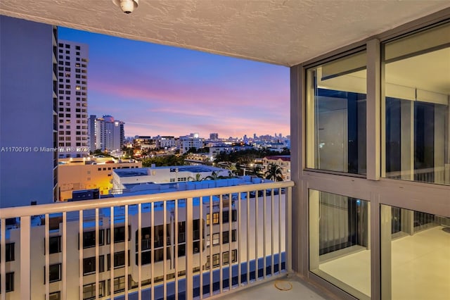 view of balcony at dusk