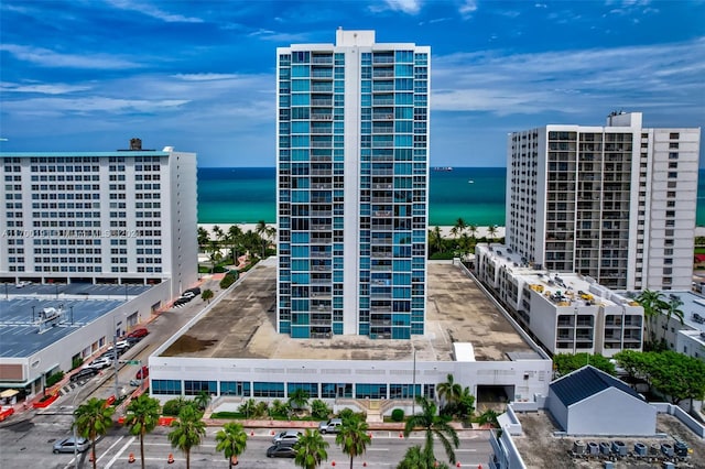 view of building exterior with a water view