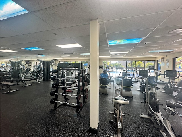 workout area with a drop ceiling