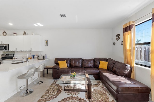 tiled living room with sink